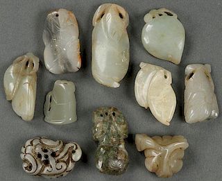 A GROUP OF TEN CHINESE CARVED JADE ORNAMENTS