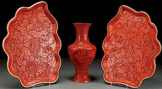 A THREE PIECE GROUP OF CHINESE CARVED CINNABAR