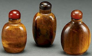 THREE CHINESE CARVED TIGERS EYE SNUFF BOTTLES