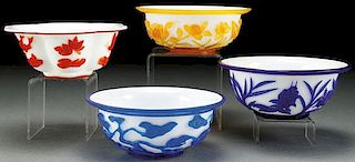 FOUR CHINESE PEKING STYLE CARVED GLASS BOWLS