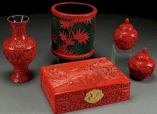 A FIVE PIECE GROUP OF CHINESE CARVED CINNABAR RED