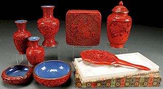 AN EIGHT PIECE GROUP OF CHINESE CARVED CINNABAR