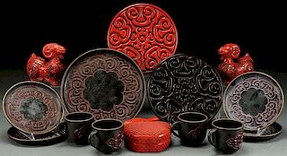 A 14 PIECE GROUP OF CHINESE CARVED CINNABAR