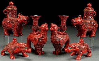 A GROUP OF SIX CHINESE CARVED CINNABAR RED