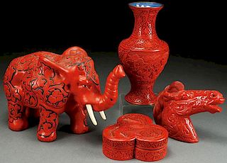 A FOUR PIECE CHINESE CARVED CINNABAR RED LACQUER