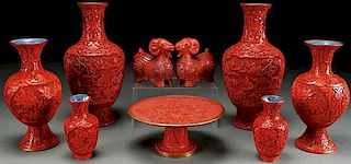 A GROUP OF NINE CHINESE CARVED CINNABAR RED