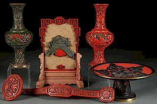 A FIVE PIECE GROUP OF CHINESE CARVED CINNABAR