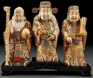 A GROUP OF THREE JAPANESE CARVED BONE FIGURES