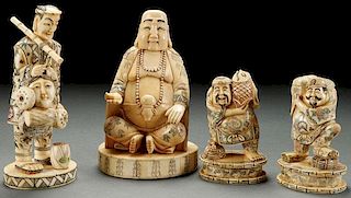 A GROUP OF FOUR CHINESE CARVED BONE FIGURES