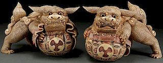 A PAIR OF CHINESE CARVED BONE TEMPLE LIONS
