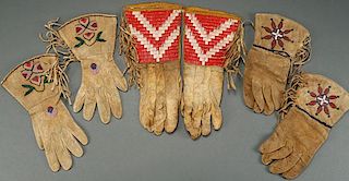 A GROUP OF THREE BEADED AND QUILLED GAUNTLETS