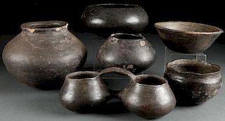 A GROUP OF SIX PREHISTORIC POTTERY PIECES