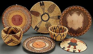 A GROUP OF SEVEN HOPI WOVEN BASKETRY ITEMS