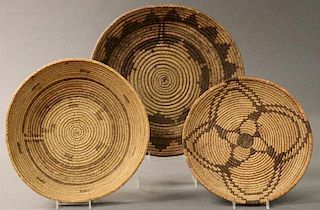 A GROUP OF THREE SOUTHWEST WOVEN BASKETS