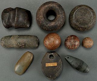A GROUP OF TEN POLISHED STONE ARTIFACTS