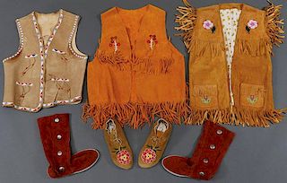 A GROUP OF FIVE NATIVE AMERICAN HIDE CLOTHING