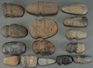A GROUP OF 15 STONE AX HEADS AND CELTS