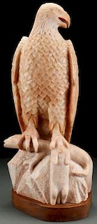 A LARGE AND IMPRESSIVE CARVED MARBLE EAGLE