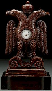 A GOOD AUSTRIAN CARVED WOOD FIGURAL WATCH STAND