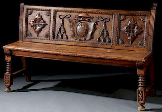 A FRENCH RENAISSANCE CARVED WALNUT BENCH