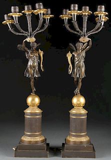 A PAIR OF FRENCH EMPIRE STYLE GILT AND PATINATED