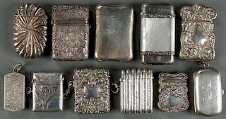 A GROUP OF 11 SILVER VICTORIAN MATCH SAFES