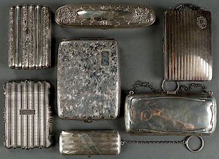 A GROUP OF SEVEN STERLING SILVER CIGARETTE