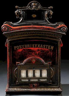 A GERMAN CAST IRON AND POLYCHROME POST LETTER BOX