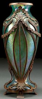 A BOHEMIAN IRIDIZED GLASS AND BRONZE MOUNTED VASE