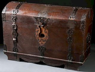 A LARGE AND IMPRESSIVE OAK AND WROUGHT IRON CHEST