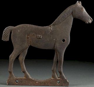 A CAST IRON HORSE WINDMILL WEIGHT, CIRCA 1900