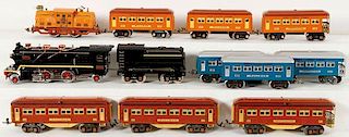 A 12 PIECE LIONEL AND MTH O GAUGE TOY TRAINS