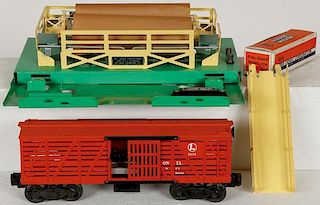 A LIONEL AUTOMATIC STOCK YARD AND CATTLE CAR