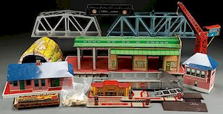 A GROUP OF TIN LITHO MODEL TOY TRAIN ACCESSORIES