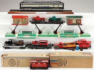 A 21 PIECE GROUP OF MODEL TOY TRAIN ACCESSORIES