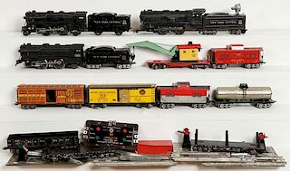 A FIFTEEN PIECE GROUP OF MARX TOY TRAINS