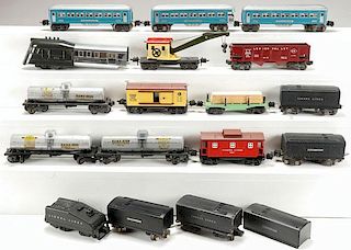 A 15 PIECE GROUP OF LIONEL O AND HO GAUGE ROLLING