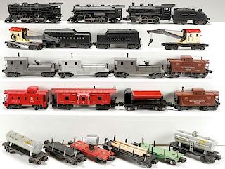 A 22 PIECE GROUP OF LIONEL ENGINES AND ROLLING