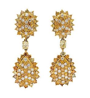 A Pair of 18 Karat Yellow Gold, Diamond and Colored Diamond Convertible Earclips, 14.20 dwts.