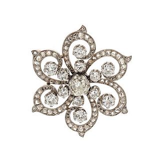 A Platinum Topped Gold and Diamond Brooch, French, 9.00 dwts.
