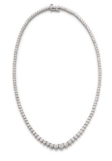 A 14 Karat White Gold and Diamond Riviera Necklace, 14.20 dwts.