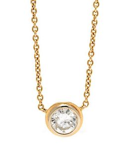 A 14 Karat Yellow Gold and Diamond Solitaire Necklace, 3.00 dwts.