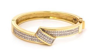 An 18 Karat Yellow Gold and Diamond Bangle Bracelet, 36.10 dwts.