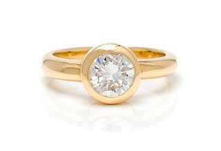 An 18 Karat Yellow Gold and Diamond Ring, 4.80 dwts.