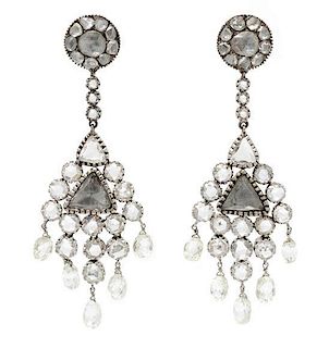 A Pair of White Gold and Diamond Pendant Earrings, 10.60 dwts.