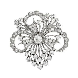 A Platinum and Diamond Floral Motif Brooch, 7.80 dwts.