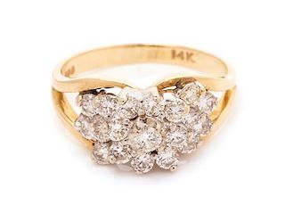 * A 14 Karat Yellow Gold Diamond Cluster Ring, 2.55 dwts.