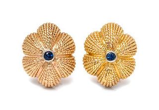 * A Pair of Yellow Gold and Sapphire Earclips, 11.00 dwts.