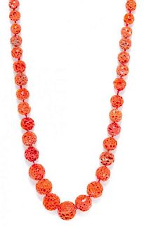 A Graduated Single Strand Coral Bead Necklace,