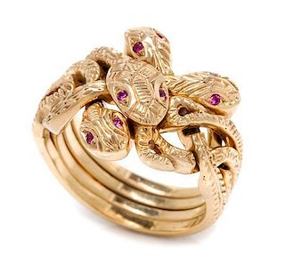 A Yellow Gold and Ruby Serpent Puzzle Ring, 12.20 dwts.